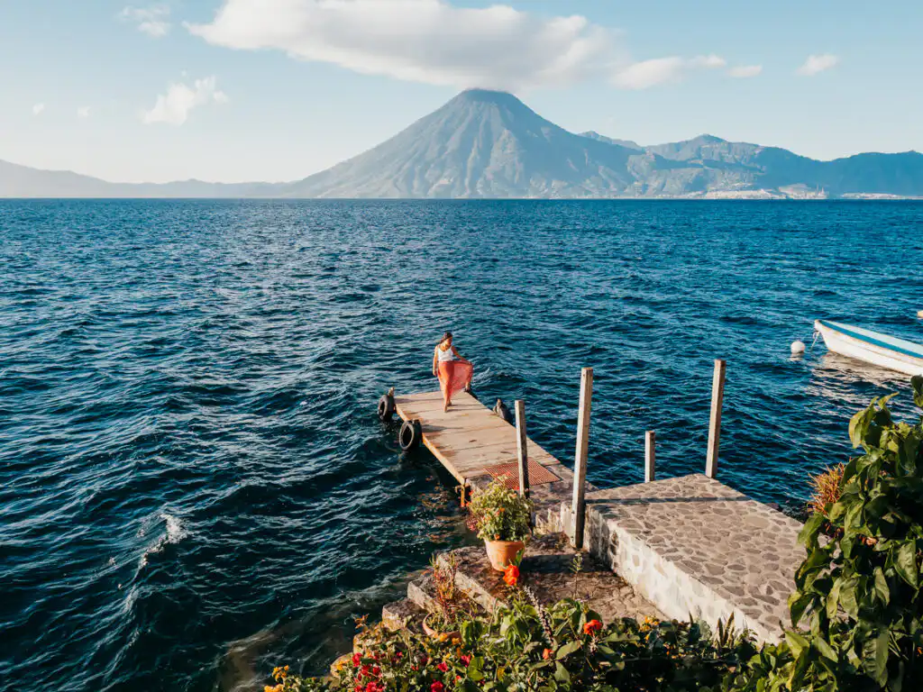 lake atitlan pier, woman standing on the dock