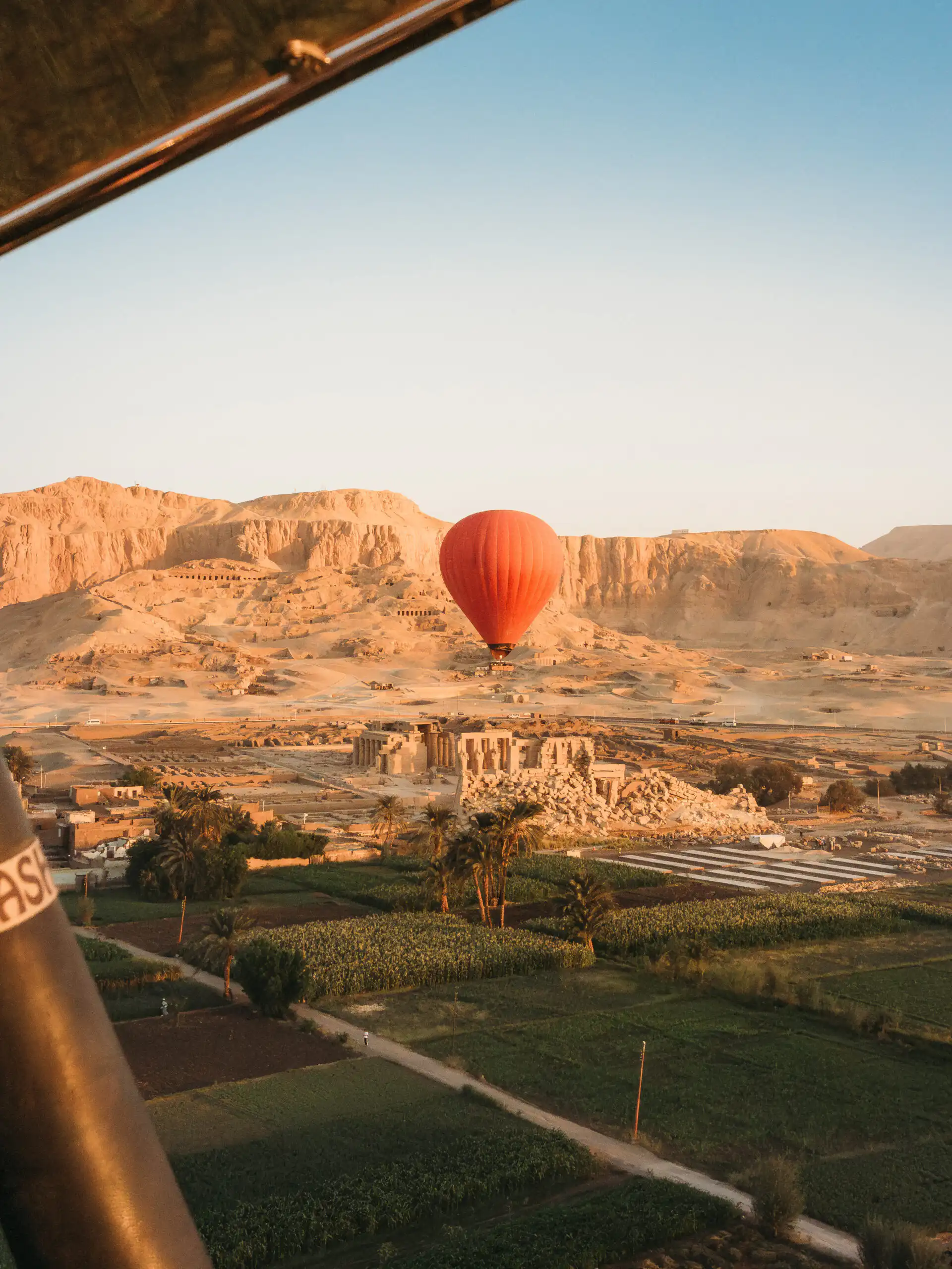hot air balloon over valley of the kings