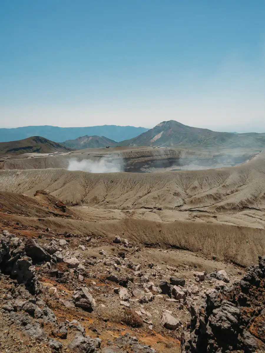 smoking mt aso crater