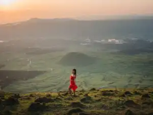 woman standing on one of the hikes in Mount Aso