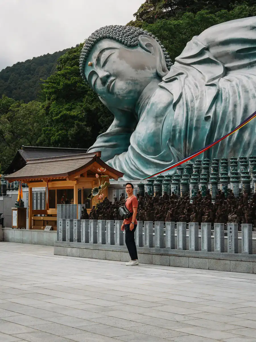 standing in front of the Buddha at Nanzo-in temple