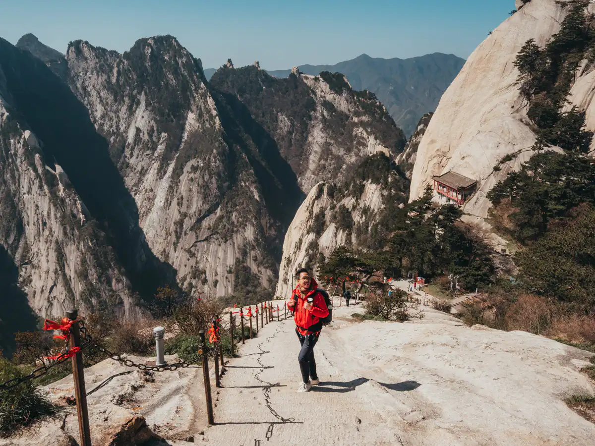 standing on the steep staircase of hua shan